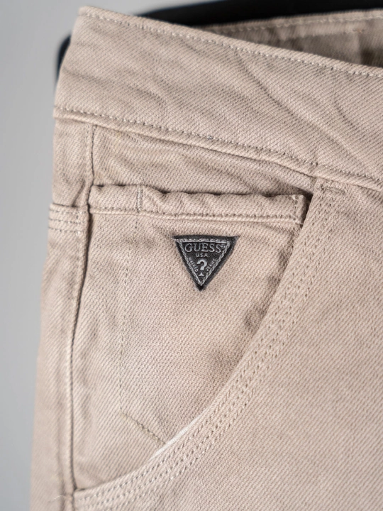 Beżowe jeansy Guess r. 44